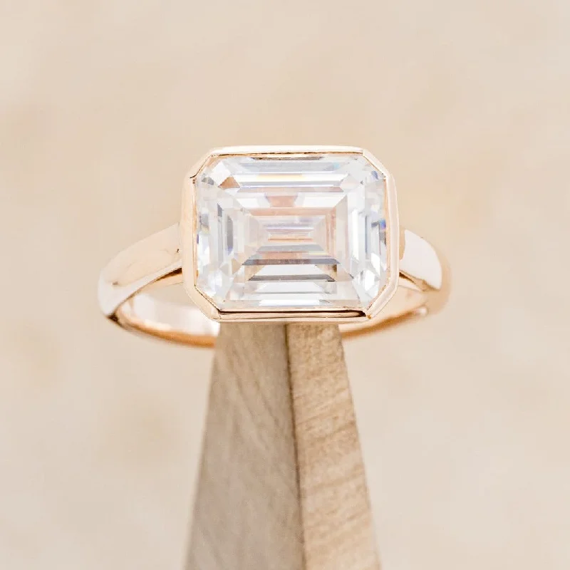 "EDITH" - EMERALD CUT MOISSANITE SOLITAIRE ENGAGEMENT RING WITH DIAMOND ACCENTS