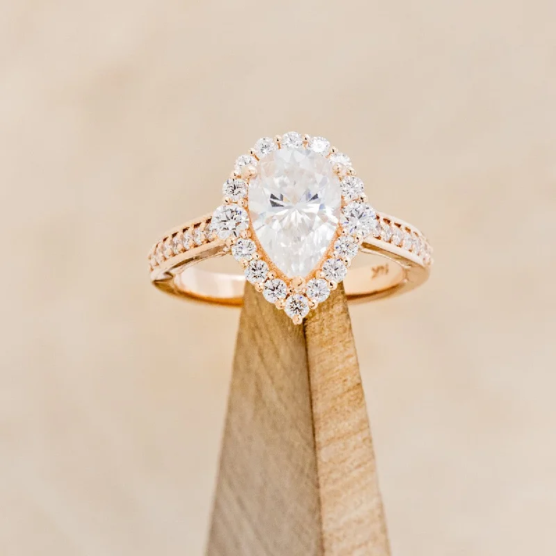 "OPHELIA" - PEAR CUT MOISSANITE ENGAGEMENT RING WITH DIAMOND HALO & ACCENTS